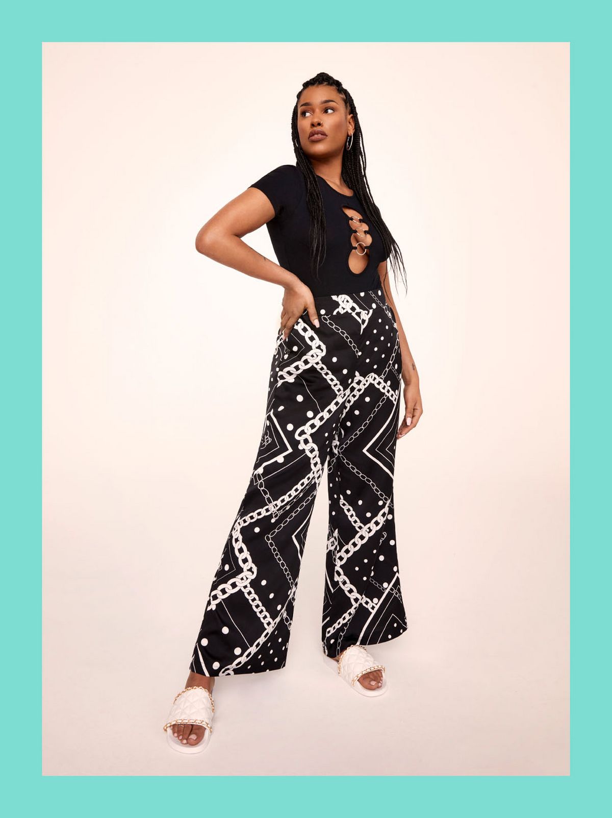 Jasmine Saunders in A Geometric Patterned Wide Leg Trouser and A Black Top
