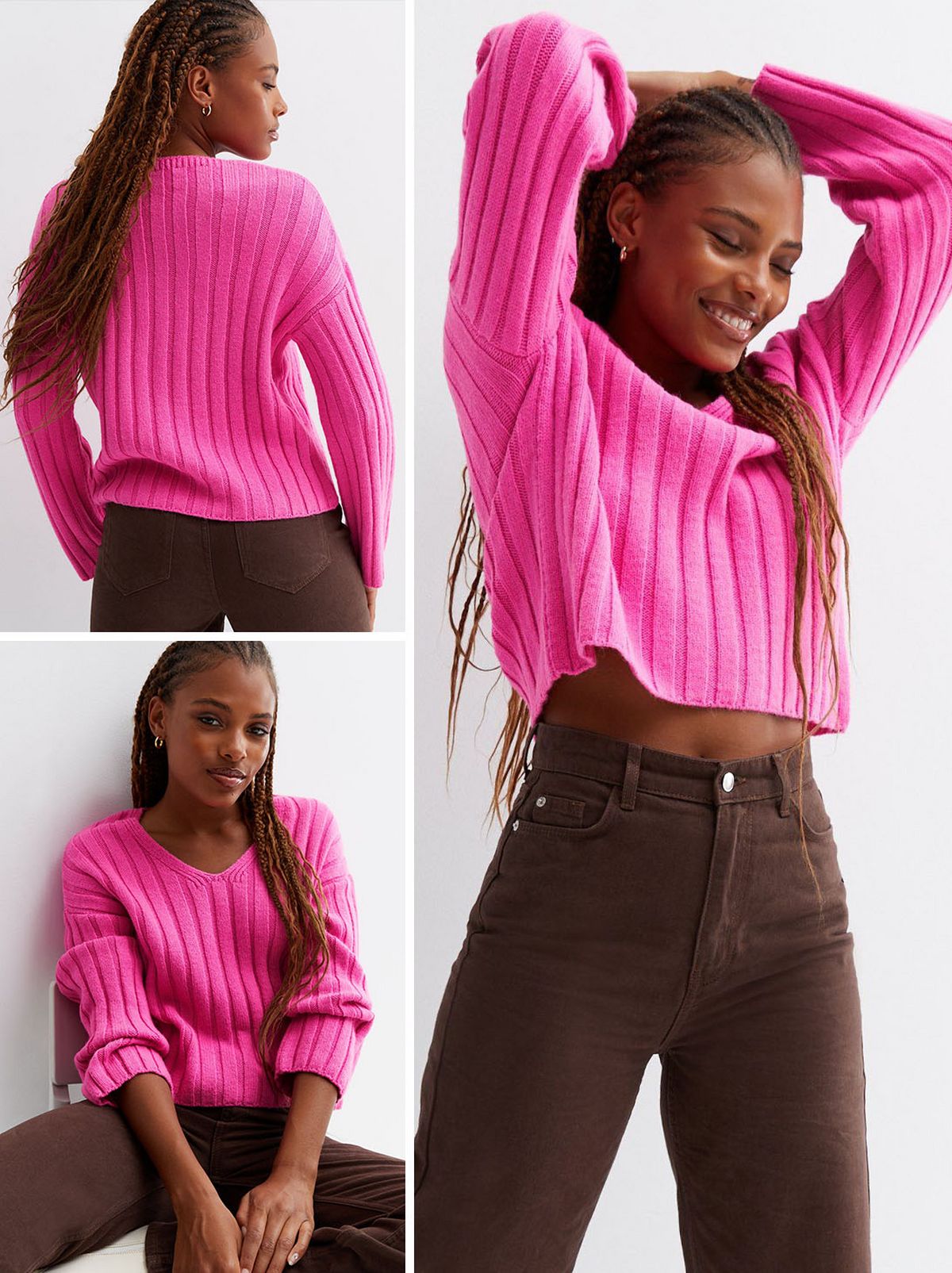A woman sitting and wearing a pink ribbed knit v neck jumper and brown trousers