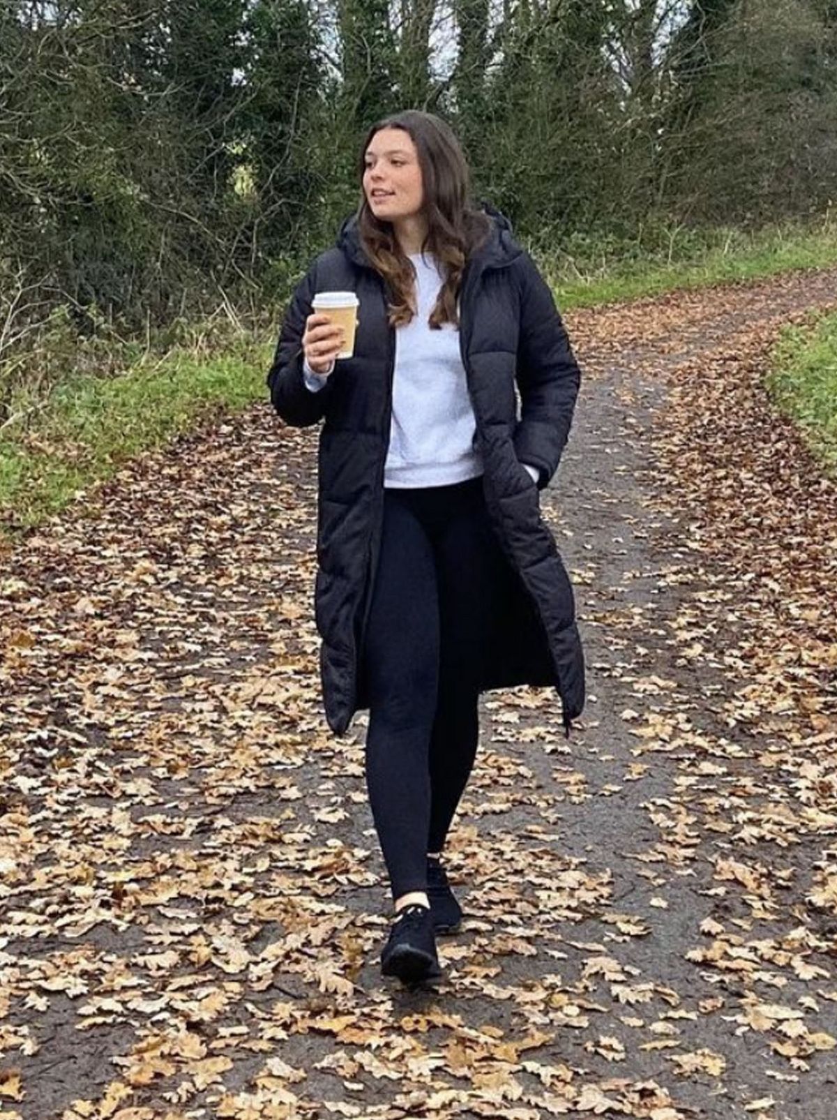 New Look's Kasey wearing a black puffer coat and black leggings