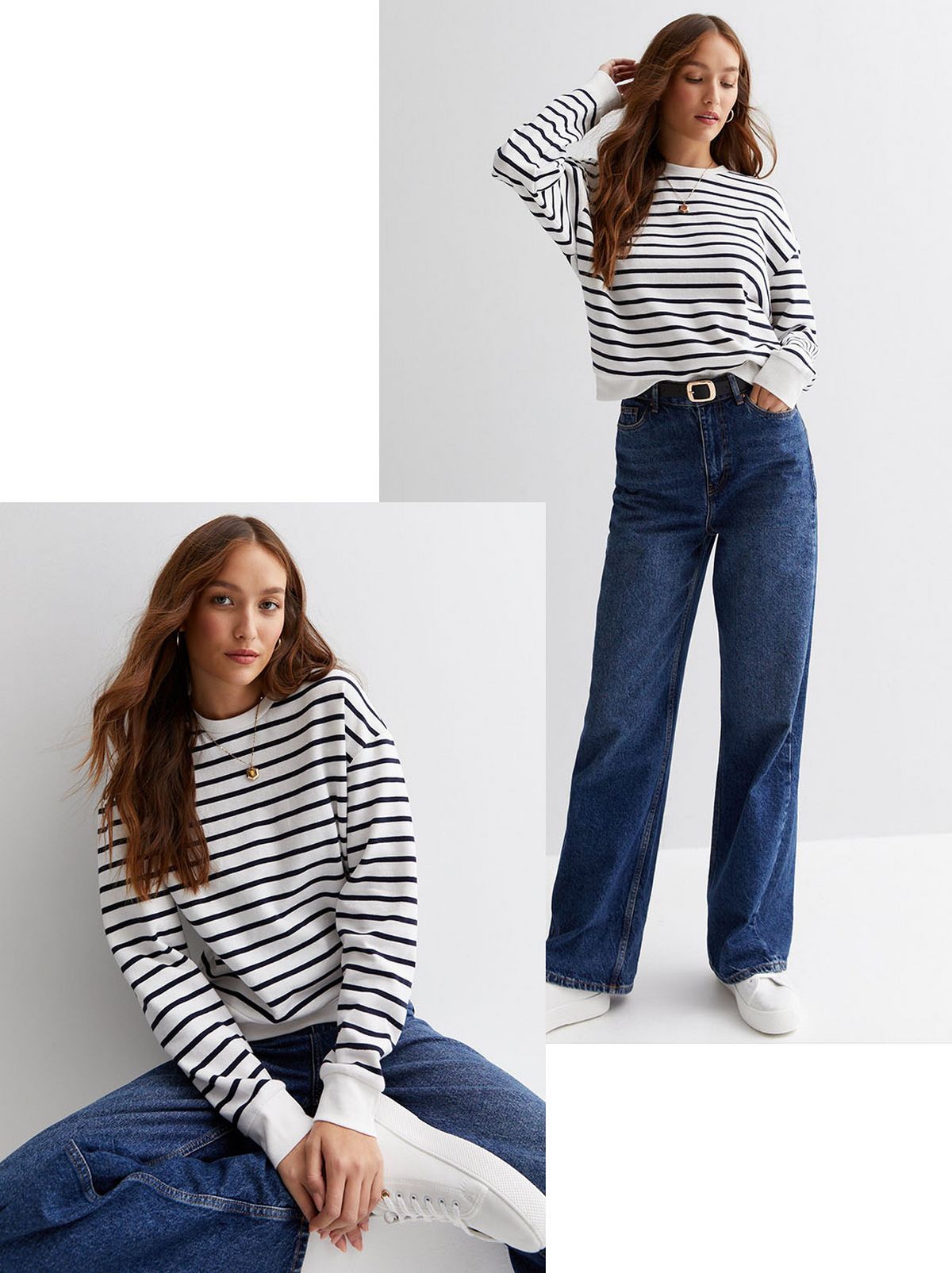 A model sits  on a white block in front of a white background looking at the camera while wearing a long sleeve striped sweatshirt and a pair of wide leg jeans