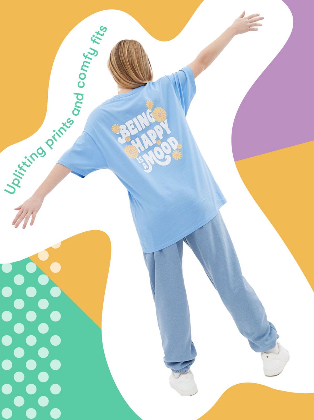 Girl wearing a blue being happy is a mood logo t shirt	