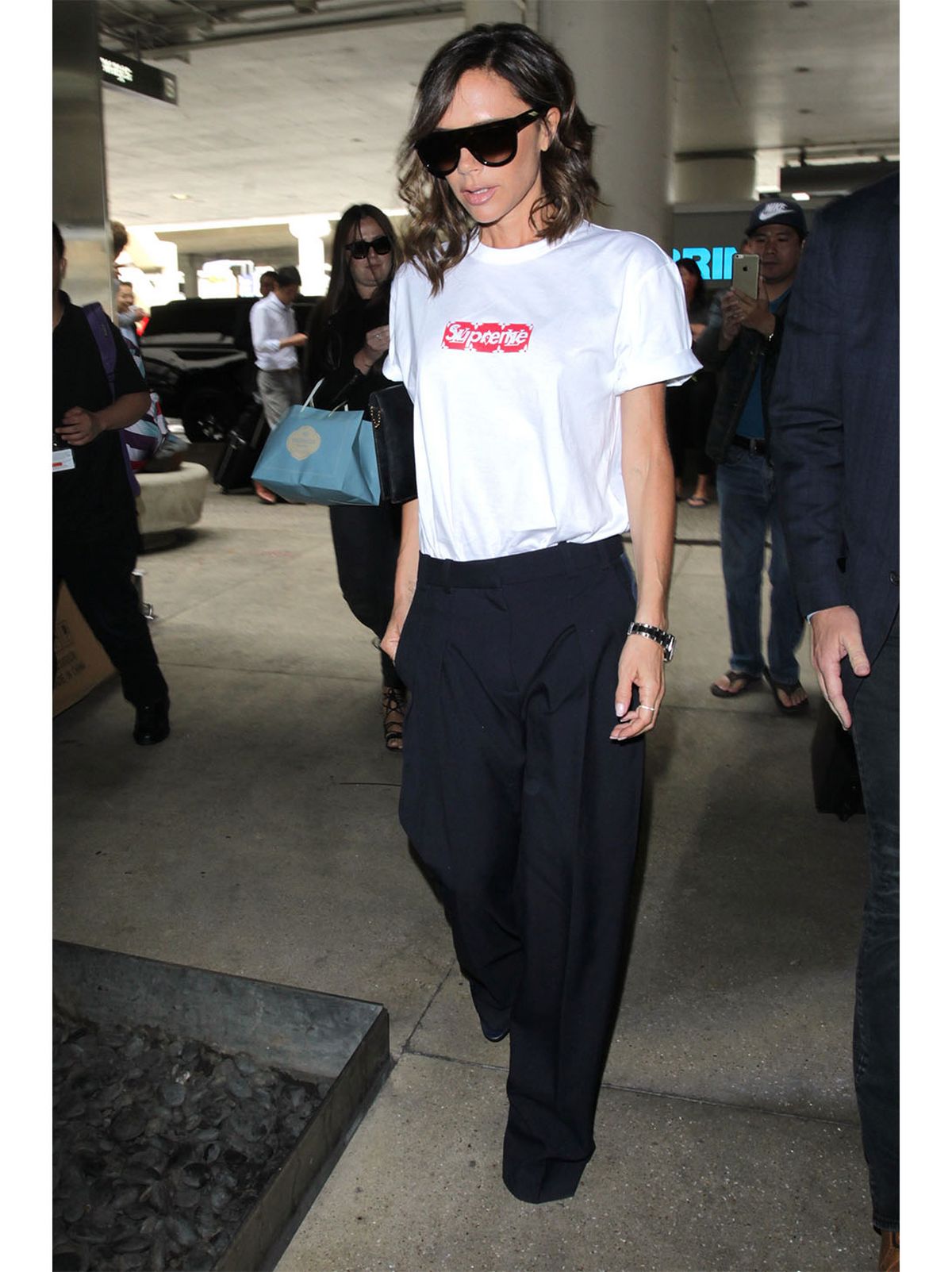 Victoria Beckham Supreme Louis Vuitton Airport Outfit