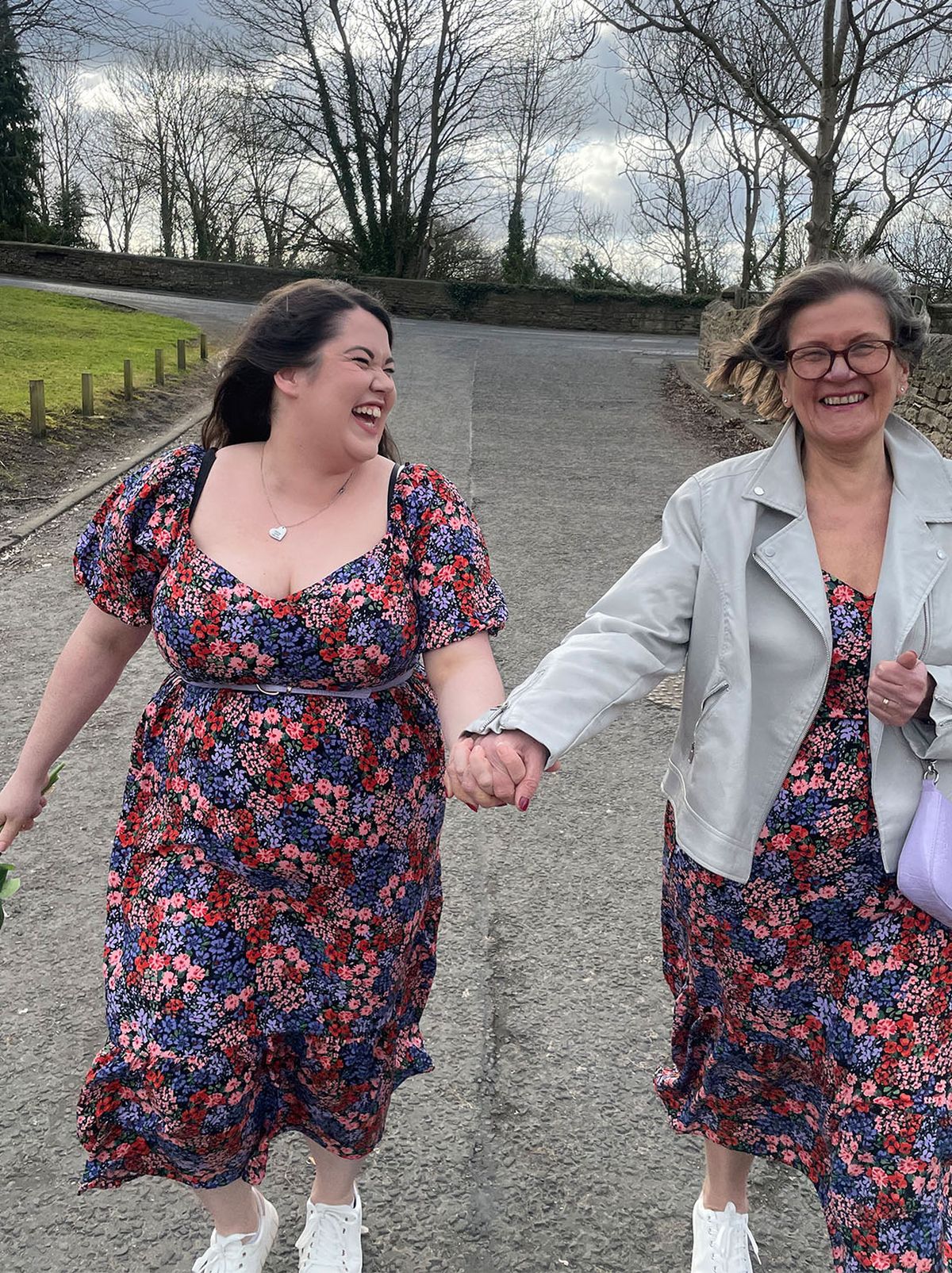 Laura H and her Mother wearing floral dresses	