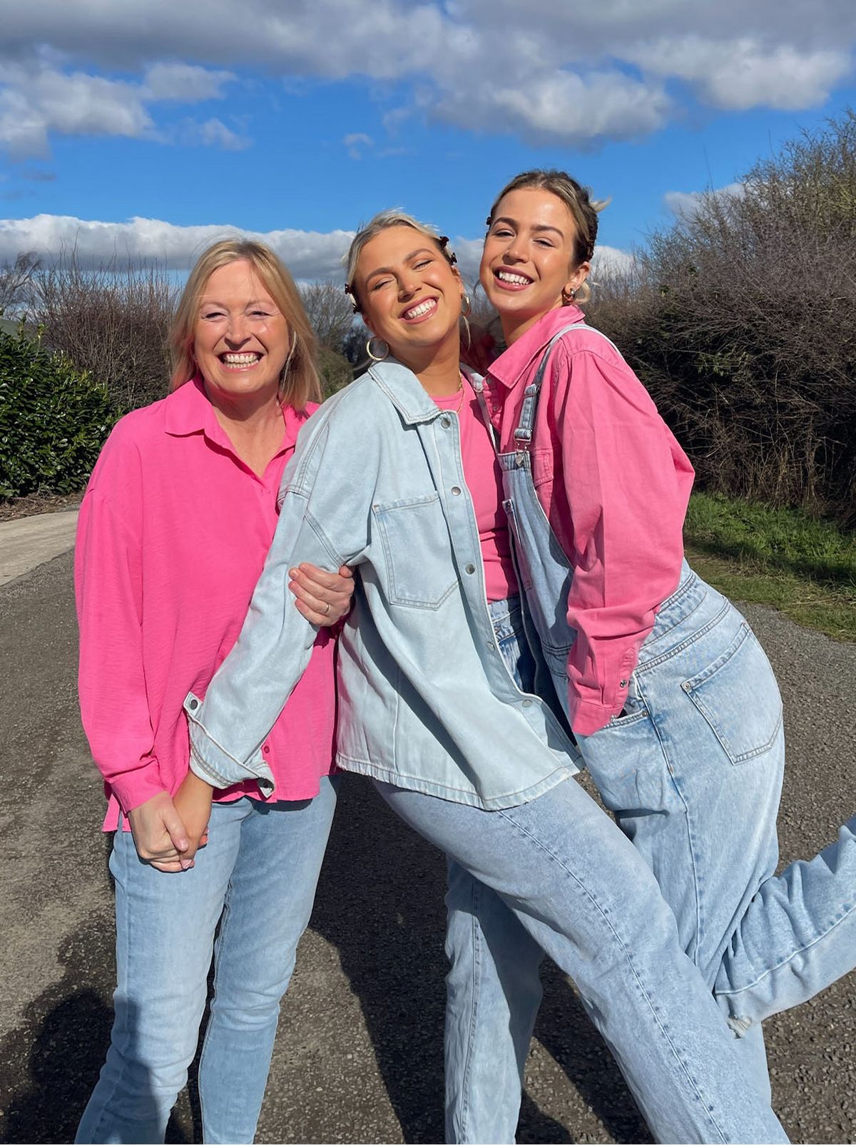 Lauren C and her mother wearing jeans and pink shirts	