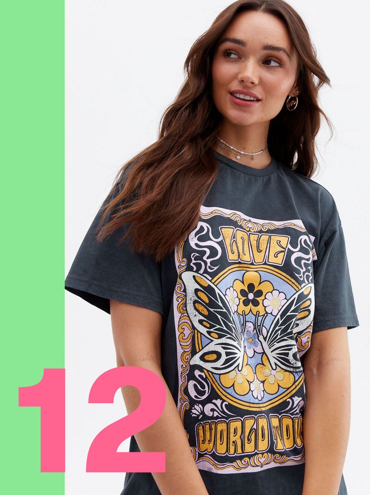 Woman wearing a grey butterfly acid wash oversized t-shirt