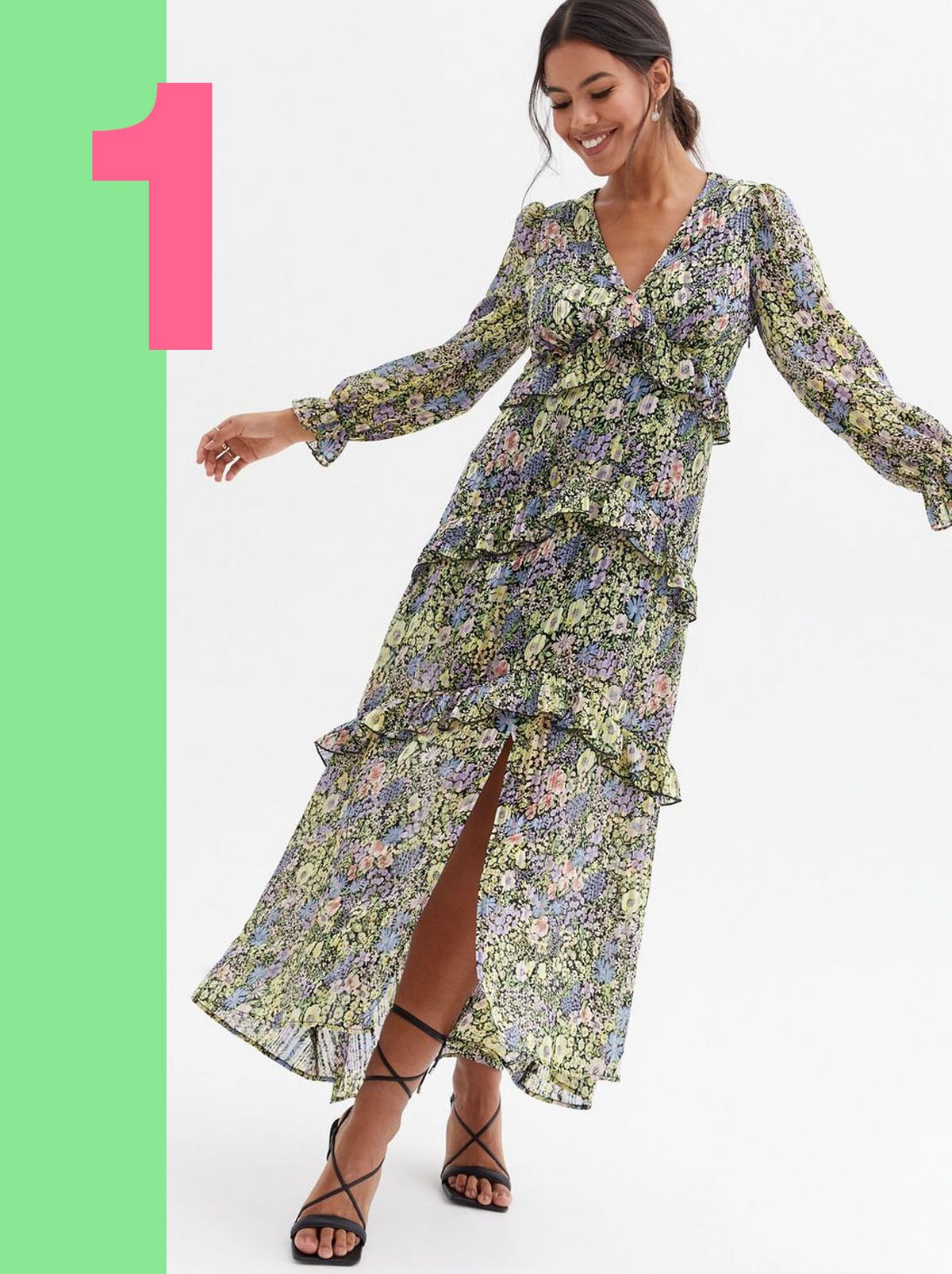 Woman wearing a black floral chiffon pleated frill maxi dress