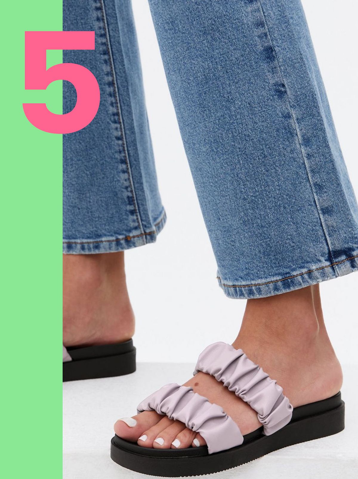 Woman wearing a lilac ruched chunky sliders
