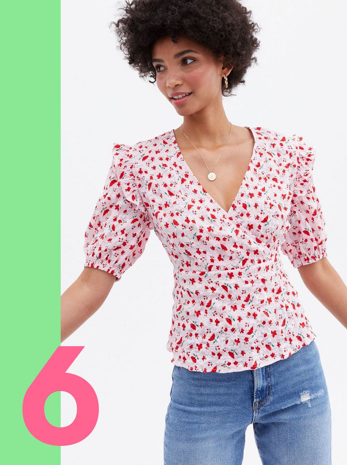 Woman wearing a ditsy floral wrap peplum blouse