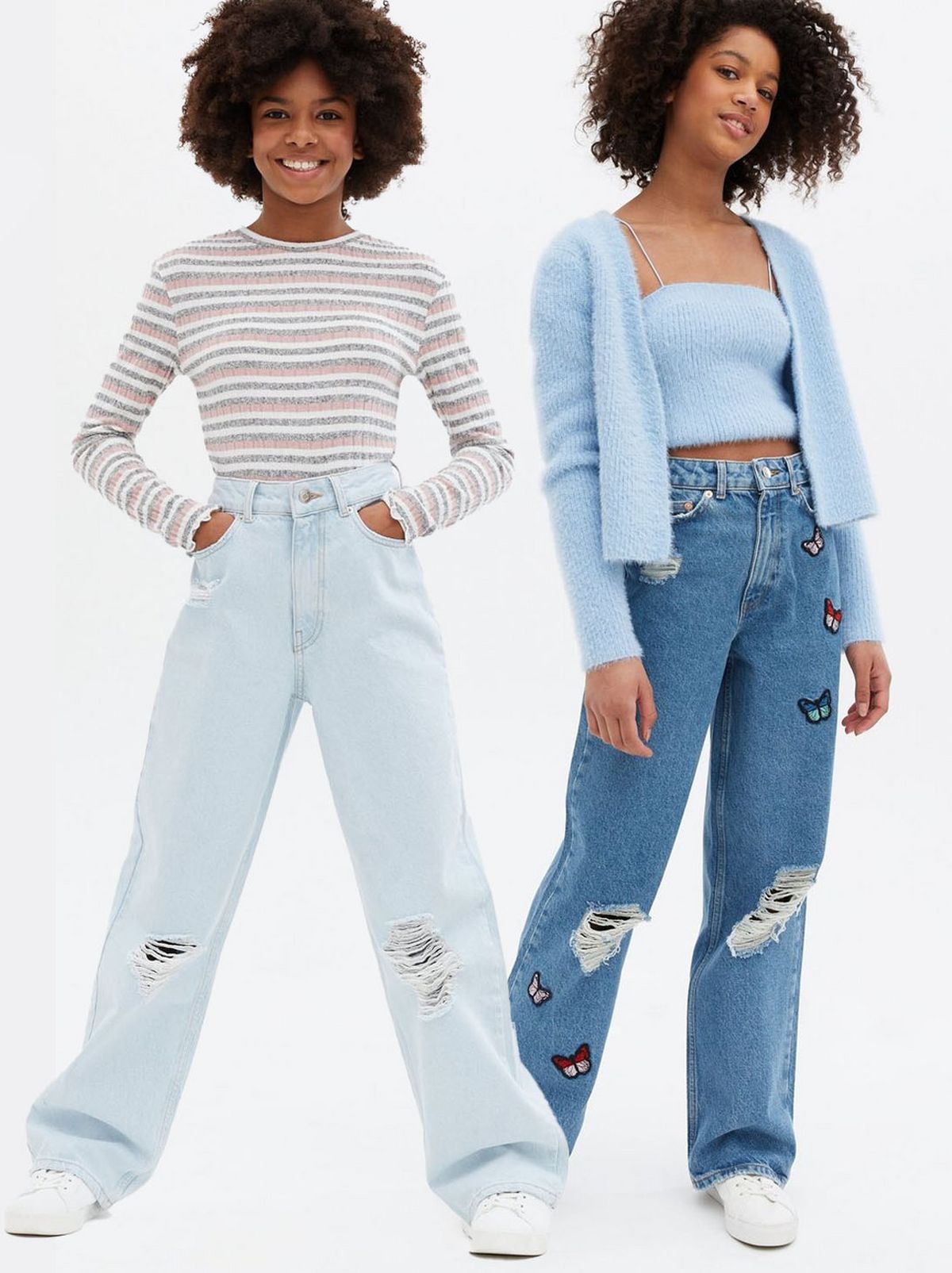 Girl wearing blue ripped wide leg high waist jeans, Girl wearing pale blue ripped high waist wide leg jeans
