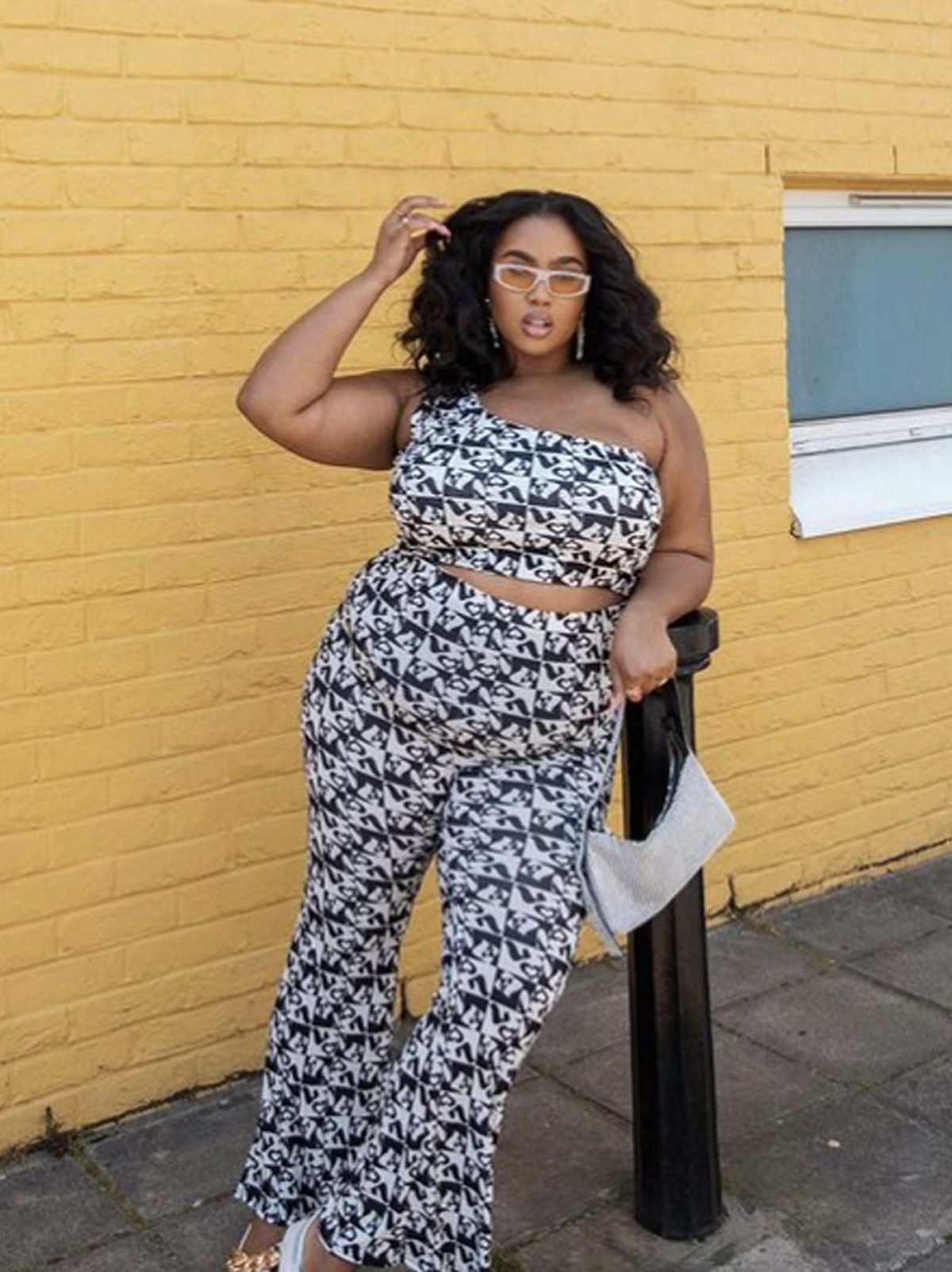@laurennicolefk wearing an Anne-Marie black and white co-ord set