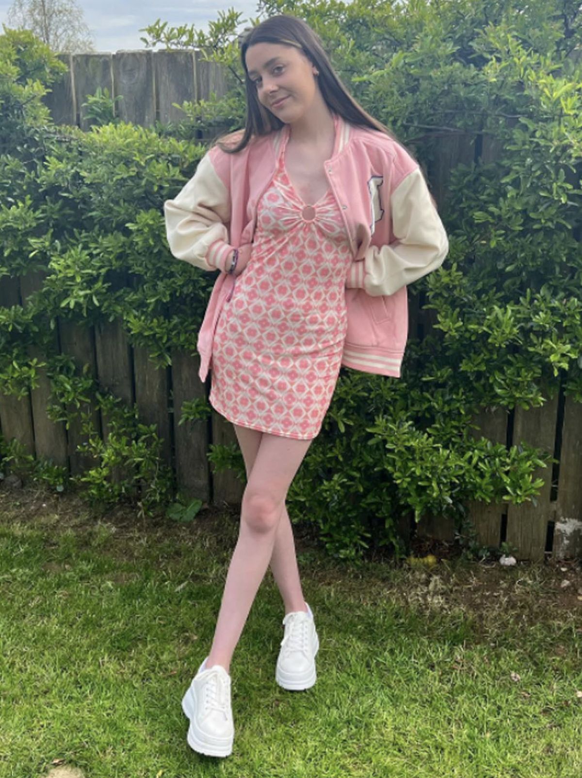 @lisaxweller wearing an Anne-Marie pink patterned dress