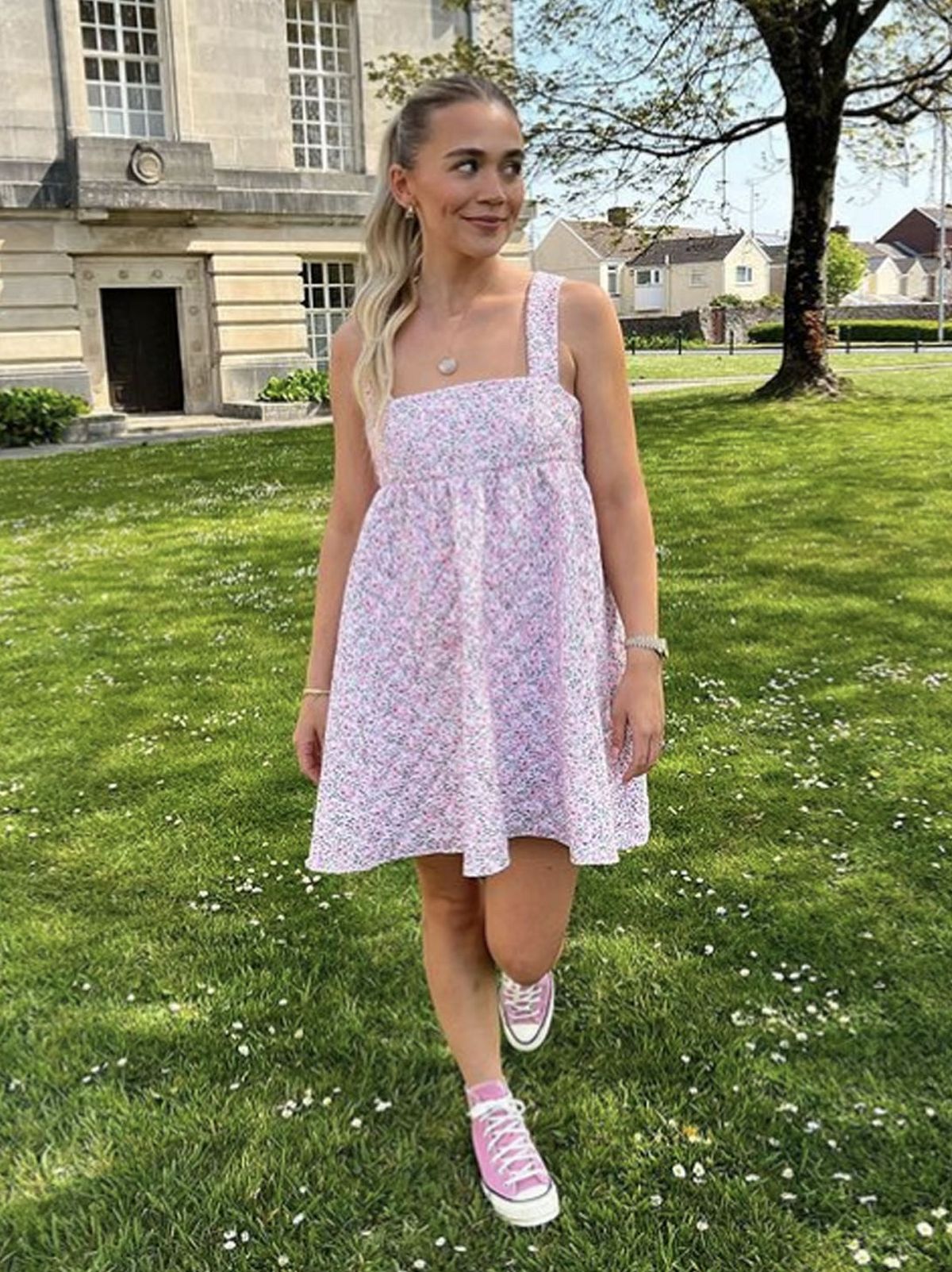 @hattiebourne wearing an Anne-Marie pink quilted dress