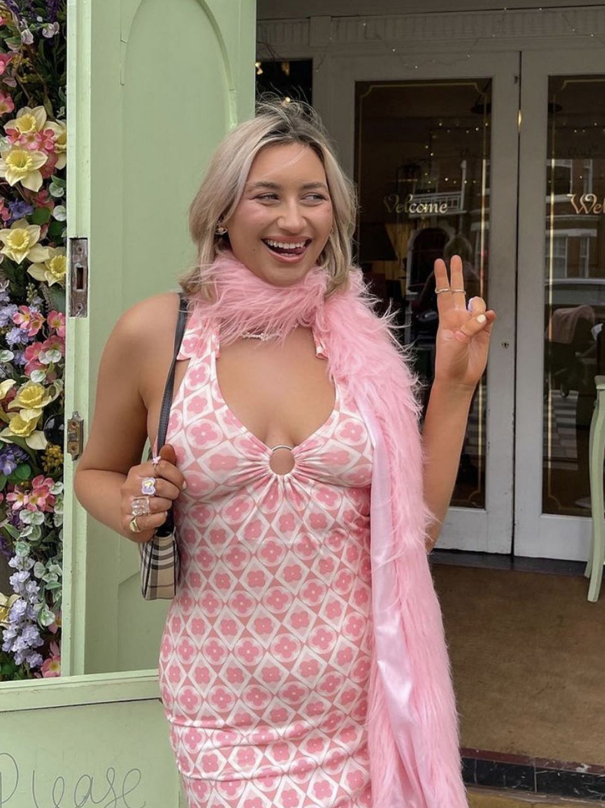 @saffyneedham  wearing an Anne-Marie pink patterned dress