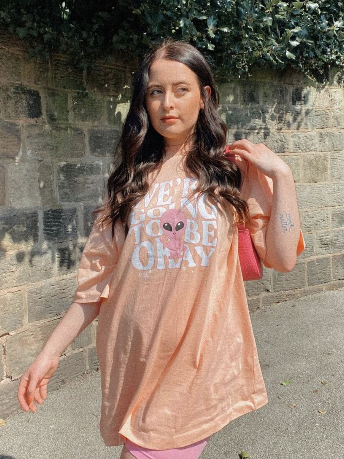 @meganroseemmonds wearing an Anne-Marie oversized t-shirt