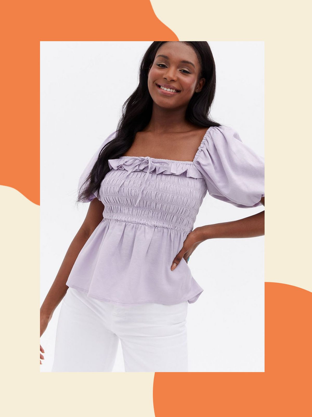 Woman wearing a lilac shirred linen frill peplum blouse