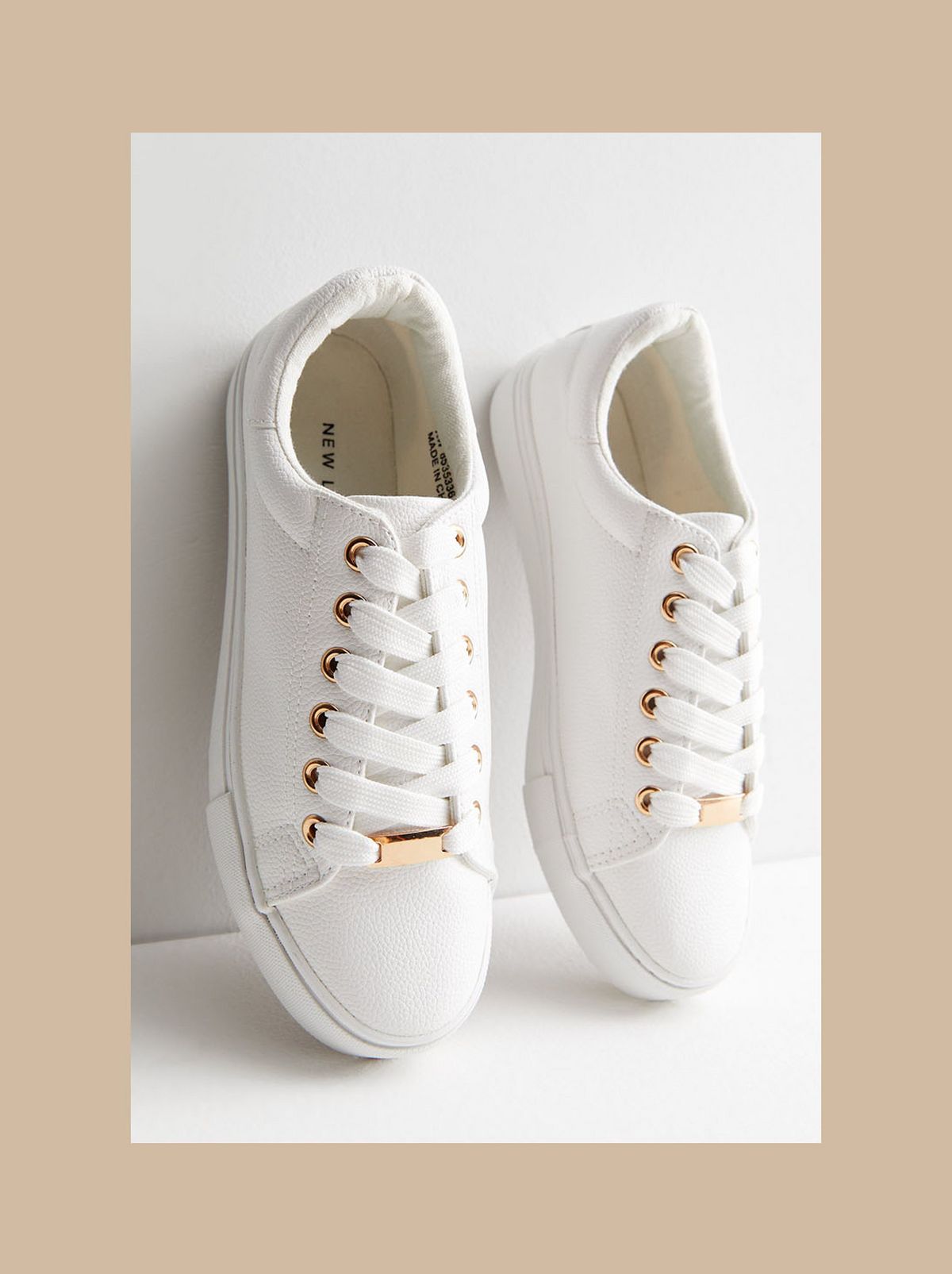 Women’s white leather looks trainers