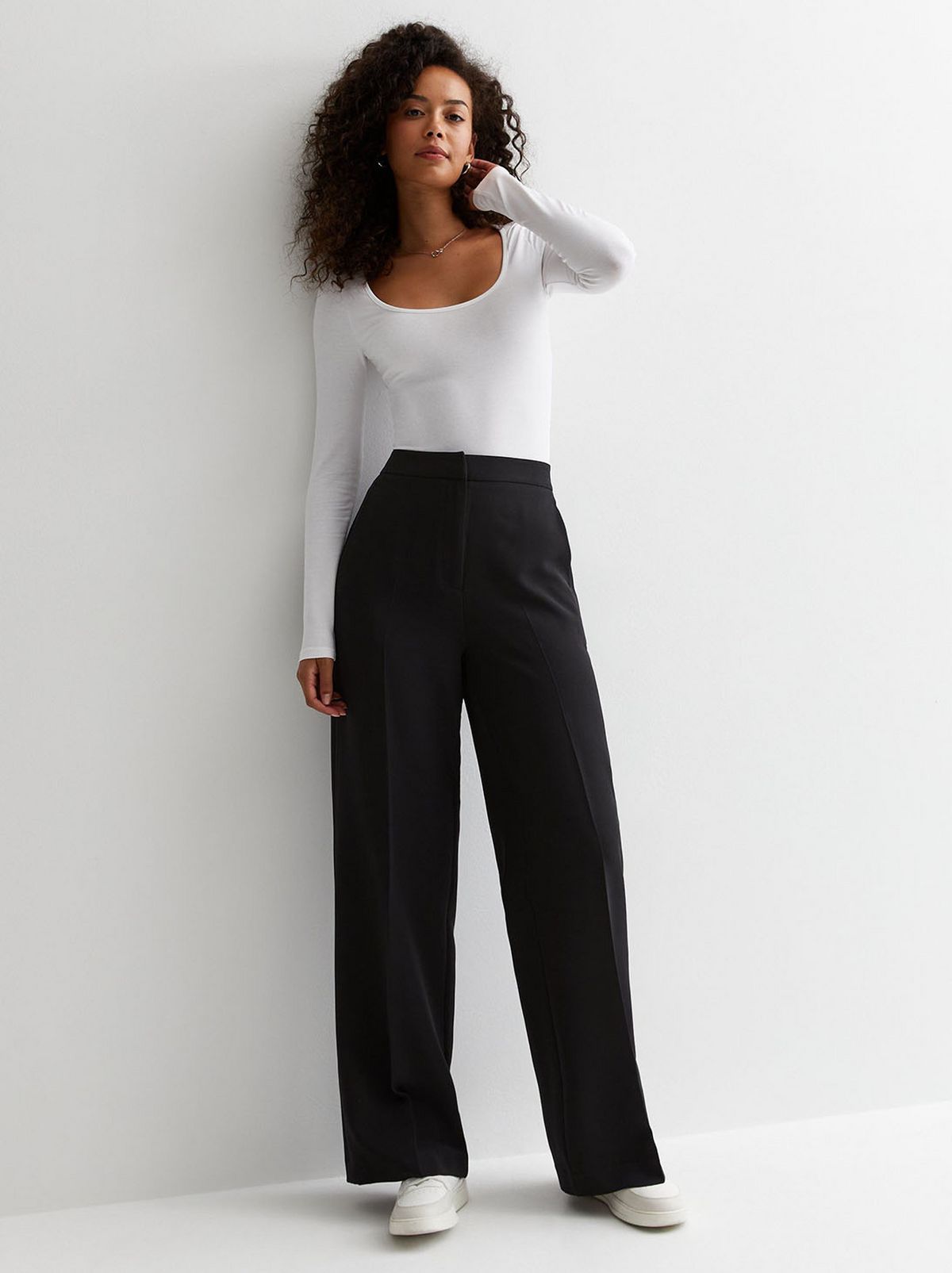 Capsule wardrobe black trousers