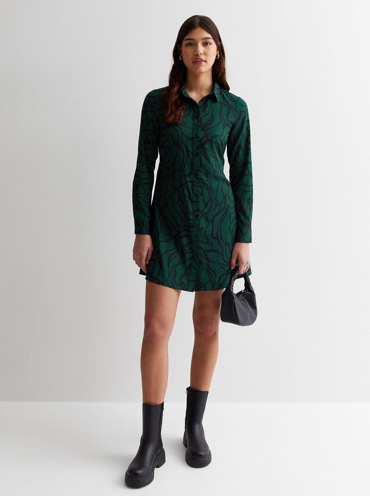 A green floral dress. Shop now