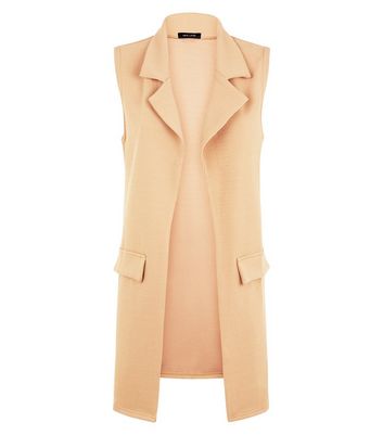 sleeveless camel jacket