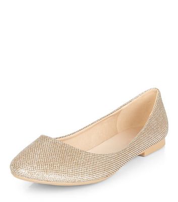 gold flat pumps