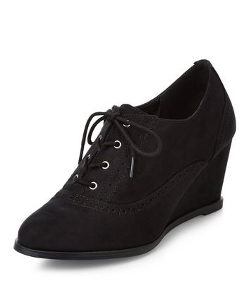 black wedge brogues