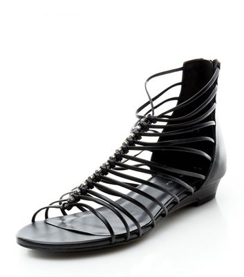 black strappy wedge shoes