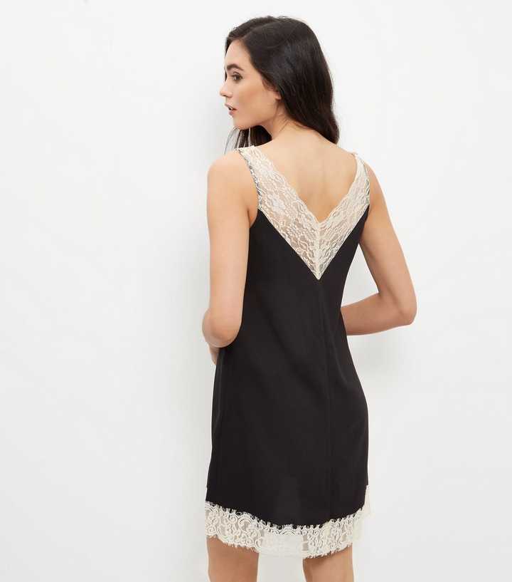 https://media2.newlookassets.com/i/newlook/371386609D3/womens/clothing/dresses/black-premium-contrast-lace-trim-slip-dress.jpg?strip=true&qlt=50&w=720