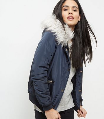 navy jacket with fur collar