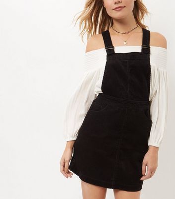 black corduroy pinafore dress