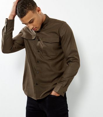 khaki shirt black jeans