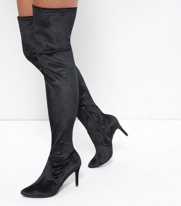 over the knee pointed boots
