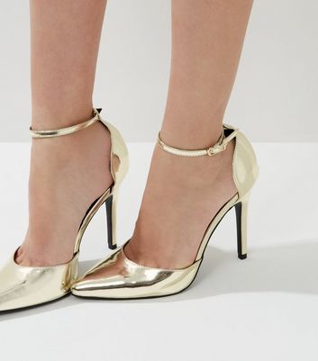 gold pointed heels with ankle strap