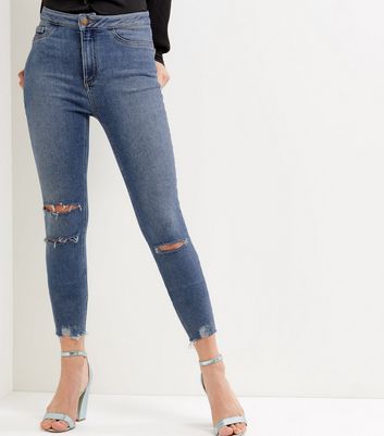 super skinny blue ripped jeans womens