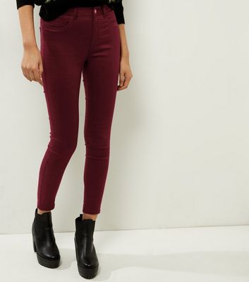 dark purple skinny jeans