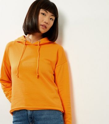 bright orange hoodies