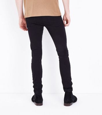 black ripped chinos