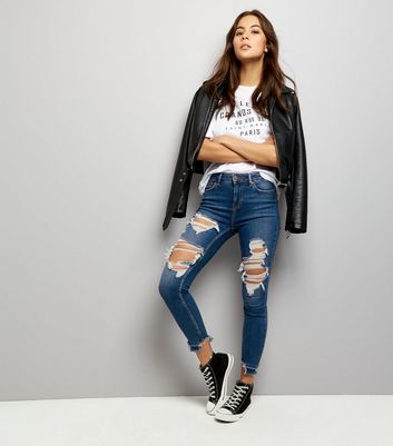 dark blue distressed jeans