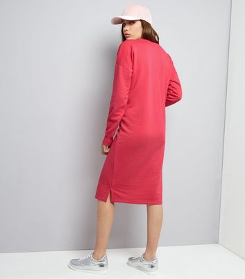bright pink jumper dress
