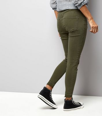 khaki green ripped jeans