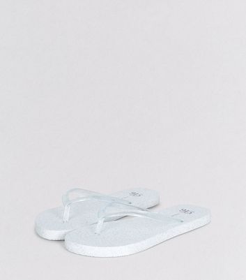 white sparkle flip flops