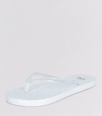 white glitter flip flops
