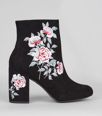 black boots with floral embroidery