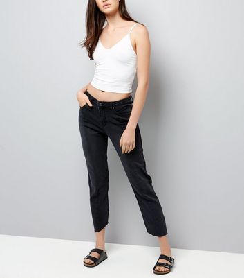 straight leg jeans with frayed hem