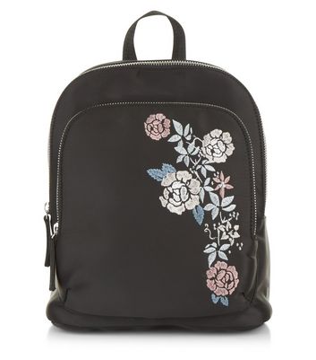 black embroidered backpack