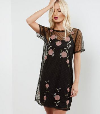 black dress with floral overlay