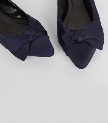 pumps with bows on front