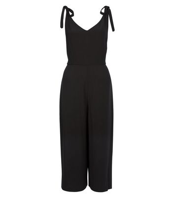 black jumpsuit with straps