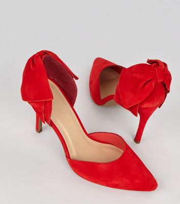 red heels with bow on back