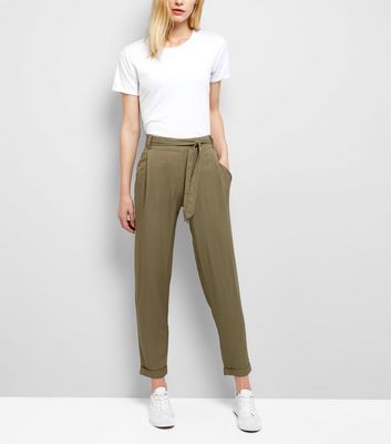 beige tie waist trousers
