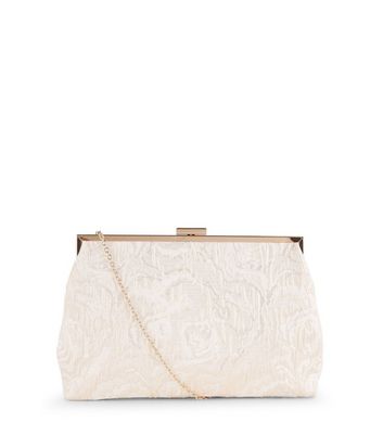 cream clutch bag new look